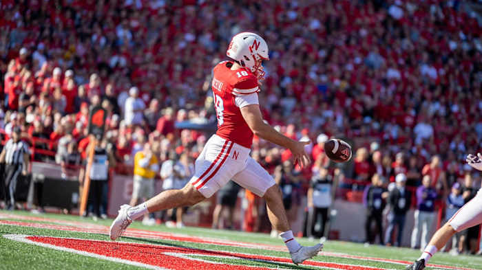 Nebraska punter Brian Buschini fires off a punt against Northwestern (Oct. 21, 2023)